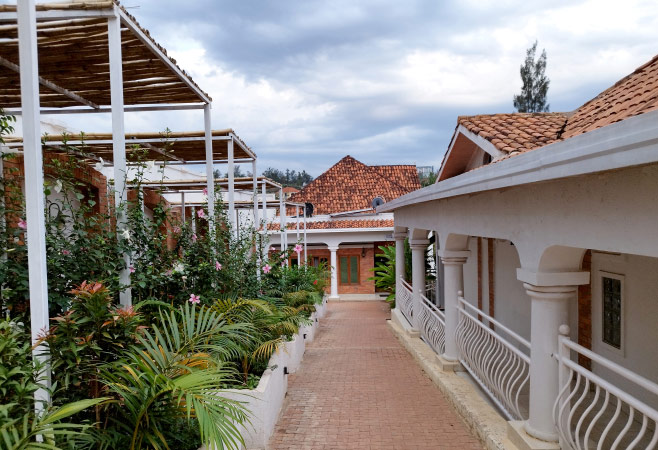 Hotel terrace with tropical garden with beautiful flowering plants in a hotel in Kigali, Rwanda